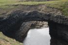 Upper Carboniferous Ross Sandstone formation eroded by wave action to leave a standing arch of sand or 